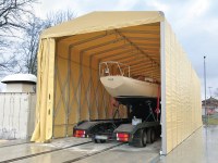 A temporary building for the yacht yard where Teuton 800 - the smallest ever custom boat - was built