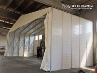 A temporary painting booth designed by Giulio Barbieri for Floatex, a leading company in the sector of floating marine products