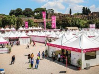 The Giulio Barbieri festival tents are dyed pink, bringing colour the Circus Maximus in Rome